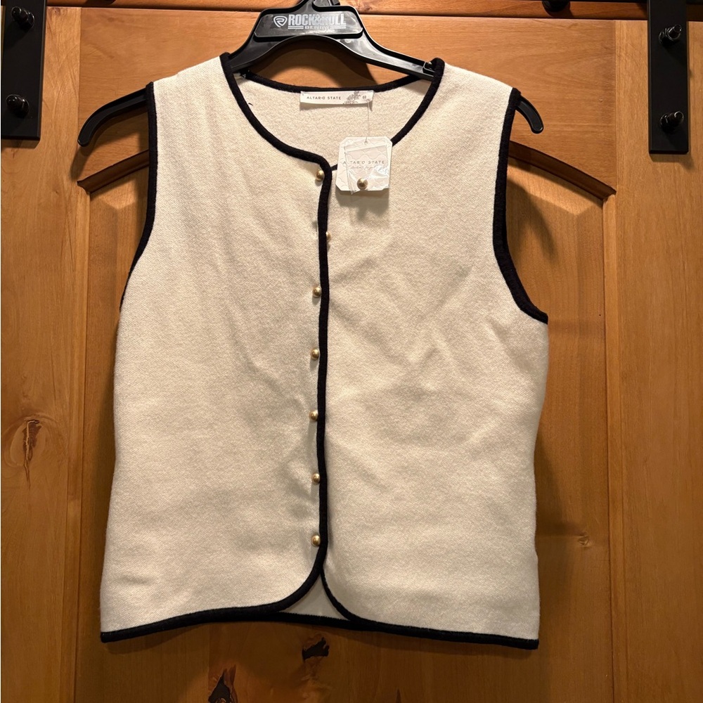 Cream Sleeveless Top with Black Trim
